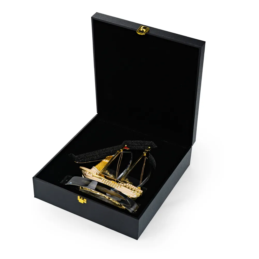Golden-Boat-Shape-Memento-in-Metal-with-Glass-Base-TR-07-with-Box.webp